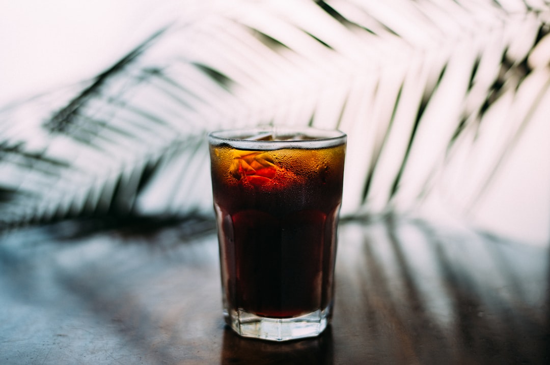 Iced coffee with syrup in a tall glass