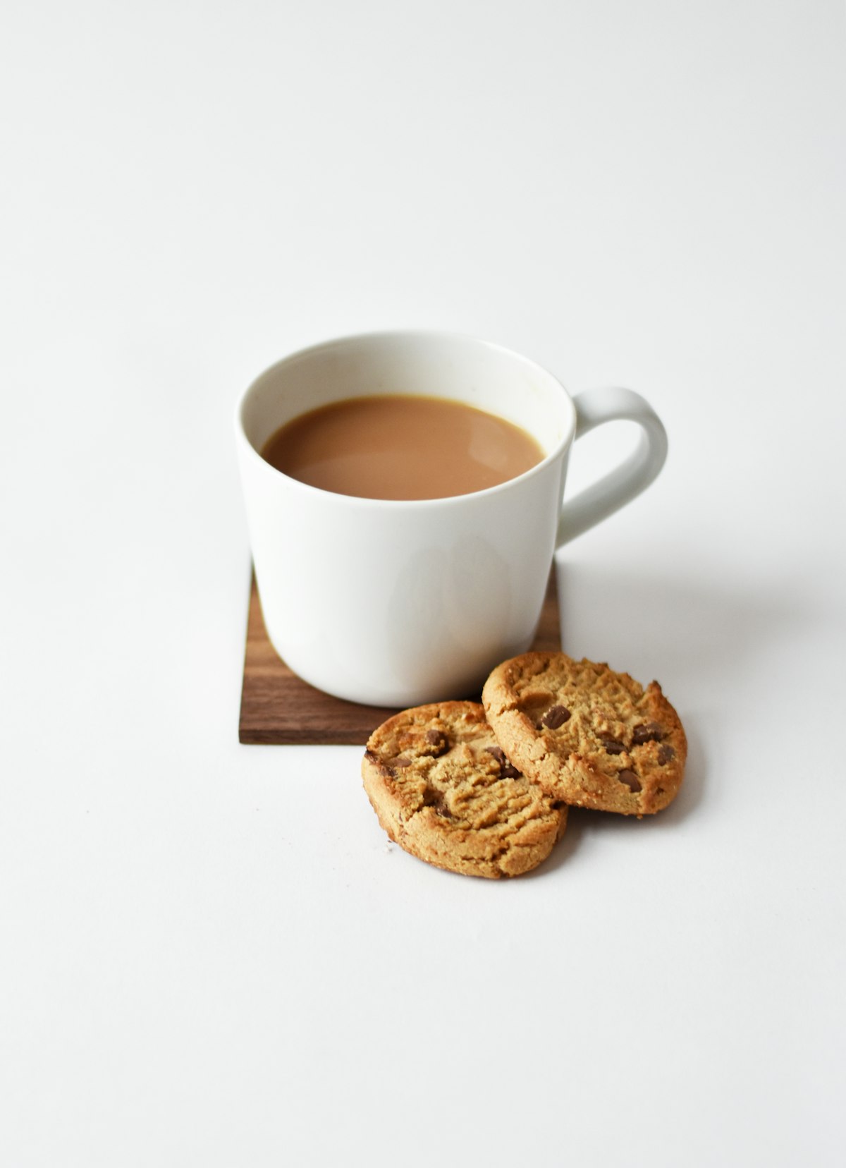 Pouring freshly brewed coffee between vessels to aerate it and soften bitter notes